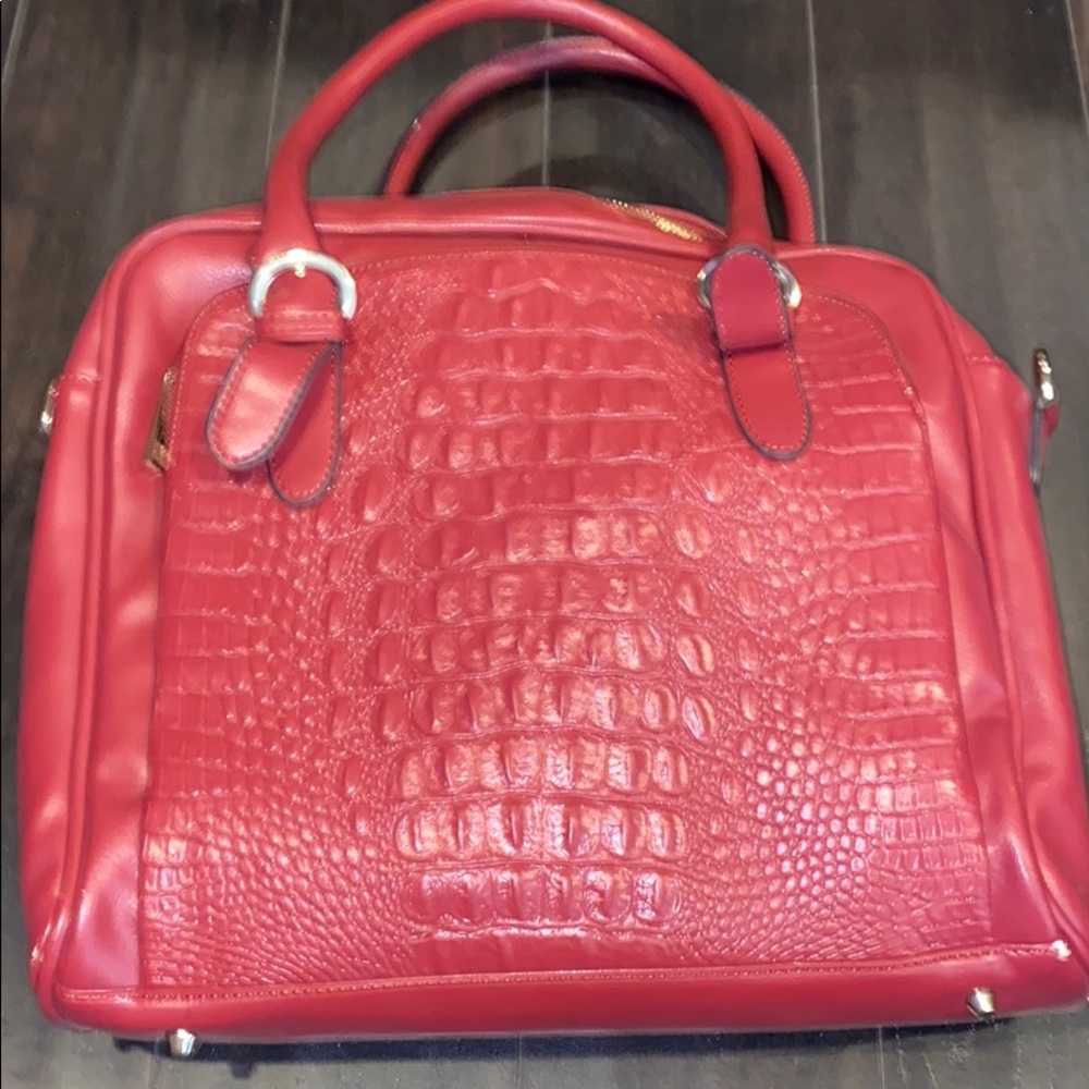 SHOEDAZZLE muted dark red handbag.